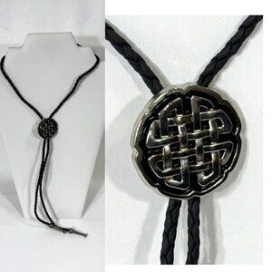 Silver-tone Celtic knot and black cord western cowboy bolo tie.